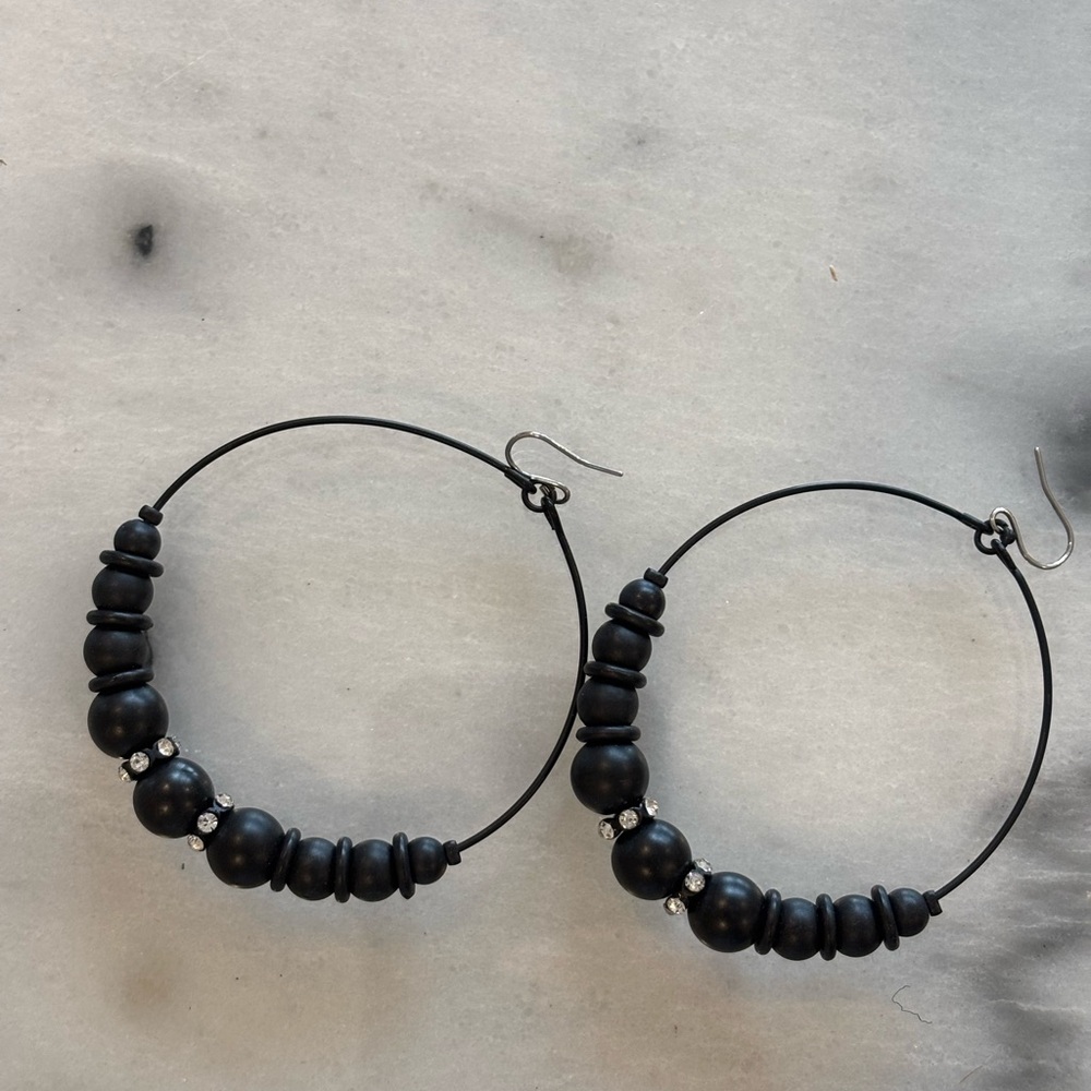 Black hoop earrings with rhinestones
